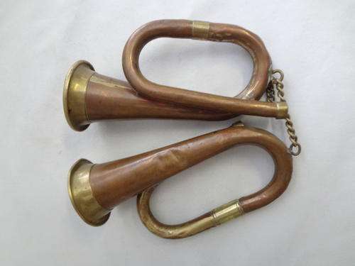 Small musical copper and brass instruments - as per photo