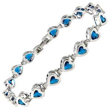 **STUNNING HEART CUT BLUE SAPPHIRE TENNIS BRACELET  SET IN  WHITE GOLD**