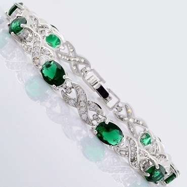 **BEAUTIFUL WHITE GOLD OVAL CUT GREEN EMERALD TENNIS BRACELET**