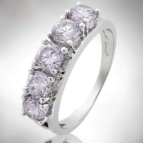 **STUNNING WHITE GOLD ROUND CUT TANZANITE JOURNEY RING**