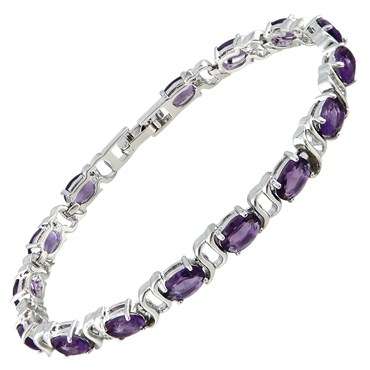 **STUNNING OVAL CUT PURPLE AMETHYST TENNIS BRACELET SET IN WHITE GOLD**
