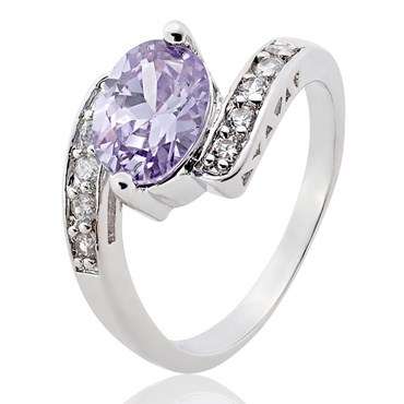 **STUNNING WHITE GOLD OVAL CUT TANZANITE RING**