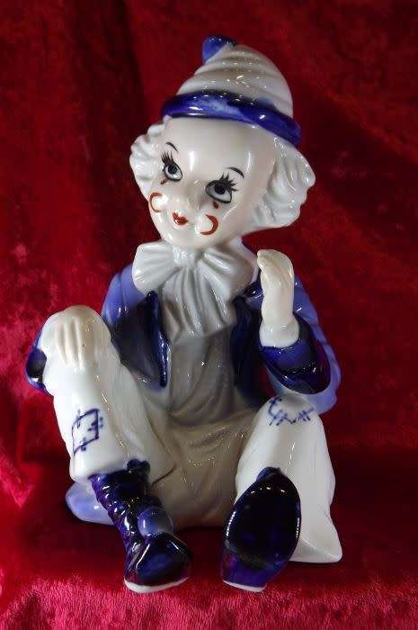 A SAD, SHY CLOWN IN BLUE AND WHITE from SUEZYT