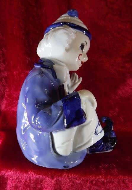 A SAD, SHY CLOWN IN BLUE AND WHITE from SUEZYT