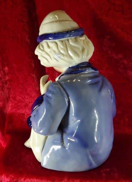 A SAD, SHY CLOWN IN BLUE AND WHITE from SUEZYT