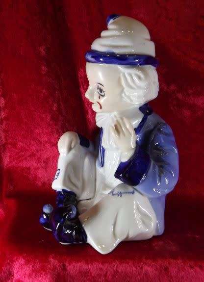 A SAD, SHY CLOWN IN BLUE AND WHITE from SUEZYT