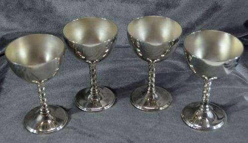 FOUR SILVER PLATE GOBLETS - from SUEZYT