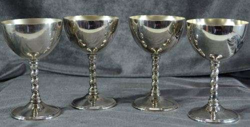 FOUR SILVER PLATE GOBLETS - from SUEZYT