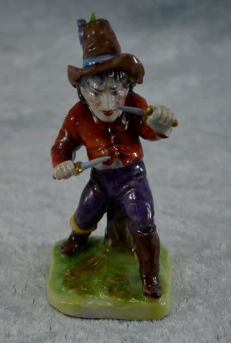 reserved for charles CONTINENTAL PORCELAIN HUNCHBACK WITH KNIVES -  from SUEZYT