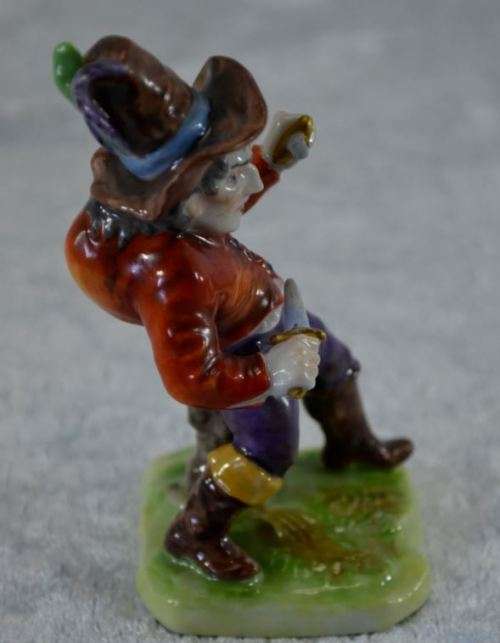 reserved for charles CONTINENTAL PORCELAIN HUNCHBACK WITH KNIVES -  from SUEZYT