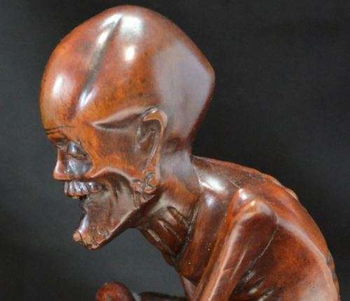 CHINESE WOOD CARVING OF A SKINNY ARHAT - from SUEZYT