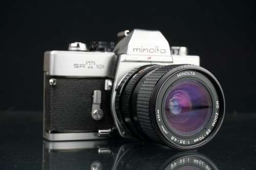 Legendary Minolta SRT101 35mm SLR with Minolta 28-70mm lens **Good Condition**