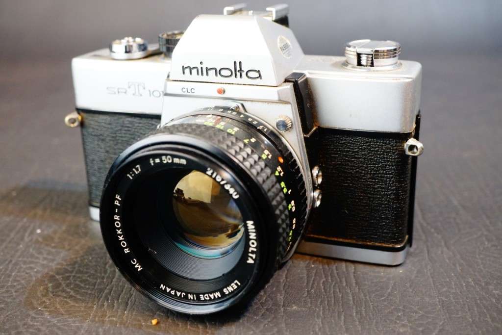 Minolta SRT 101 35mm SLR Camera with Minolta 50mm F1.7 Lens and Half Case  **Excellent Condition**
