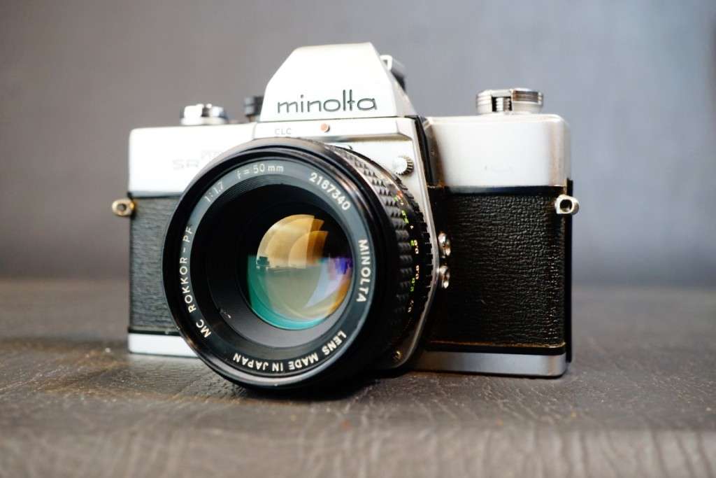 Minolta SRT 101 35mm SLR Camera with Minolta 50mm F1.7 Lens and Half Case  **Excellent Condition**