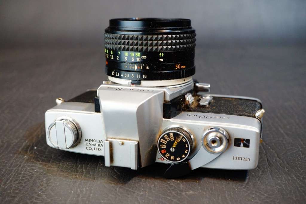 Minolta SRT 101 35mm SLR Camera with Minolta 50mm F1.7 Lens and Half Case  **Excellent Condition**