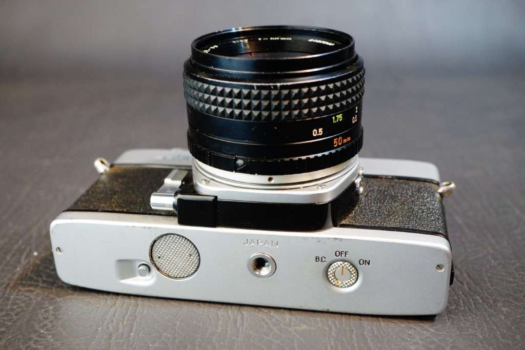 Minolta SRT 101 35mm SLR Camera with Minolta 50mm F1.7 Lens and Half Case  **Excellent Condition**