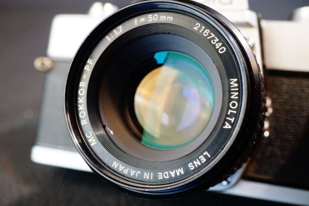 Minolta SRT 101 35mm SLR Camera with Minolta 50mm F1.7 Lens and Half Case  **Excellent Condition**