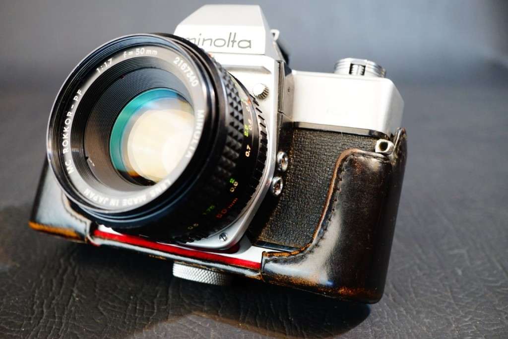 Minolta SRT 101 35mm SLR Camera with Minolta 50mm F1.7 Lens and Half Case  **Excellent Condition**