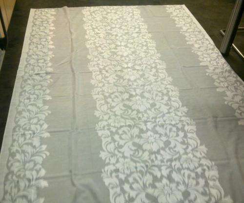 Sheer white tablecloth