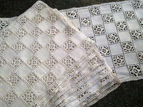 Eight Lefkara lace placemats with matching runner