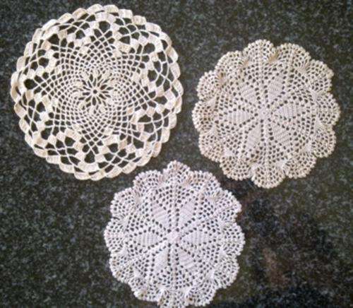 Three pretty sand coloured crochet doilies - 17cm & 13cm