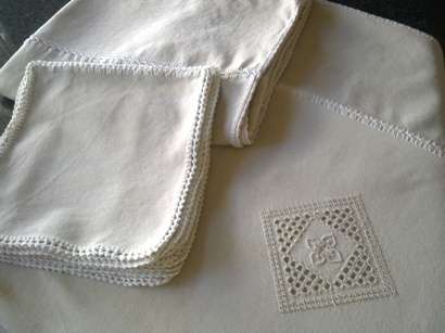 Two large tablecloths with cutwork hand embroidery & crochet detail + 12 serviettes