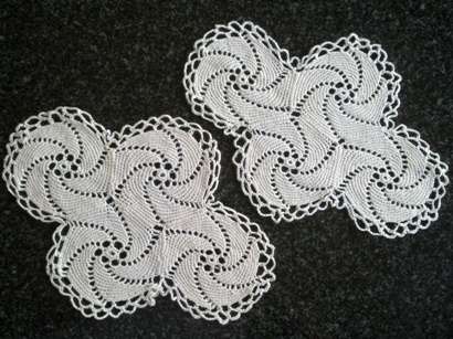 Two pretty pinwheel cotton crochet doilies