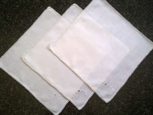 Three pretty white linen lunch napkins