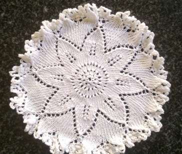 Unusual pretty pair of knitted doilies 19cm
