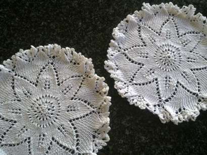 Unusual pretty pair of knitted doilies 19cm
