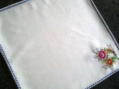 Beautiful set of eight embroidered linen dinner serviettes