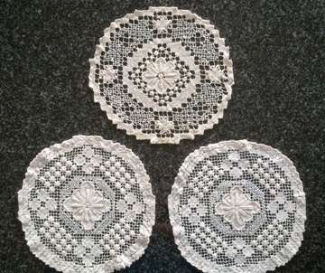 Three lovely hand knotted lace doilies