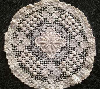 Three lovely hand knotted lace doilies
