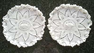 Two pretty knitted cotton doilies 21cm