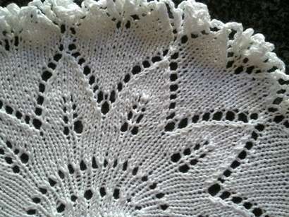 Two pretty knitted cotton doilies 21cm