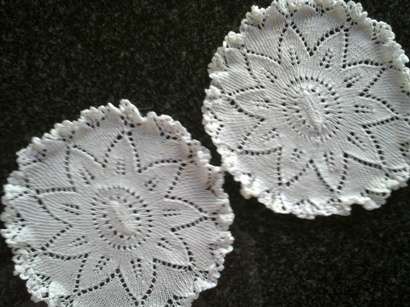 Two pretty knitted cotton doilies 21cm