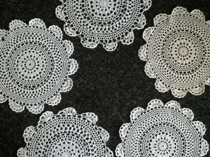 Five white cotton crochet doilies 23cm