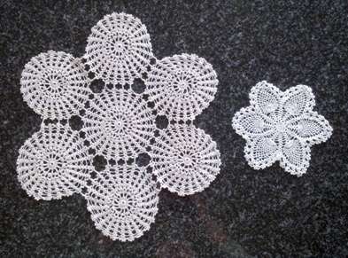 Two dainty antique crochet doilies