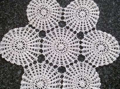 Two dainty antique crochet doilies