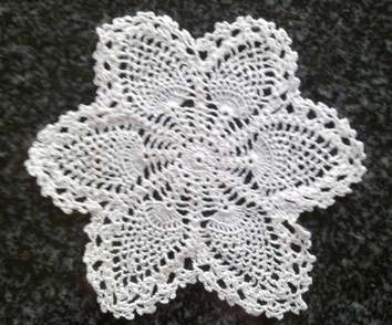 Two dainty antique crochet doilies