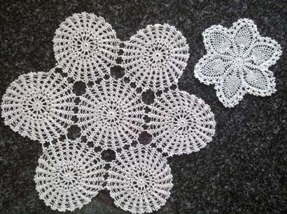 Two dainty antique crochet doilies