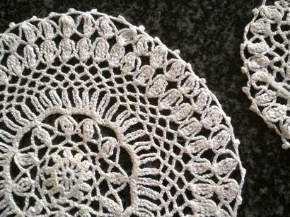 Pretty set of five crochet doilies