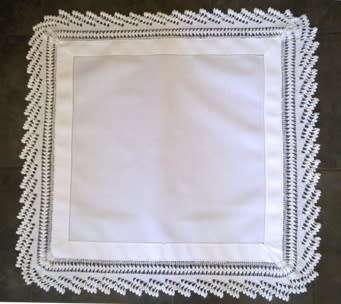 Striking antique white linen centre piece