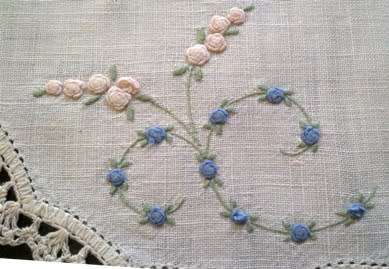 Dainty hand embroidered linen doilie 21cm