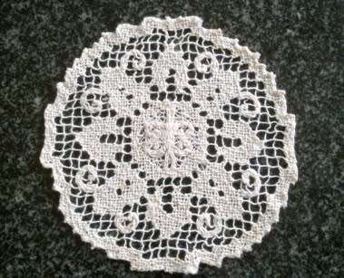 Collection of hand knotted lace doilies