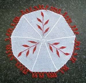 Unusual glass beaded doilie with leaf pattern