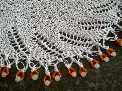 Unusual knitted glass beaded doilie