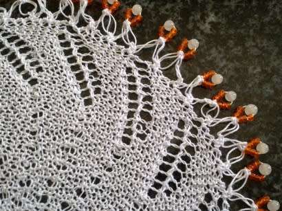 Unusual knitted glass beaded doilie