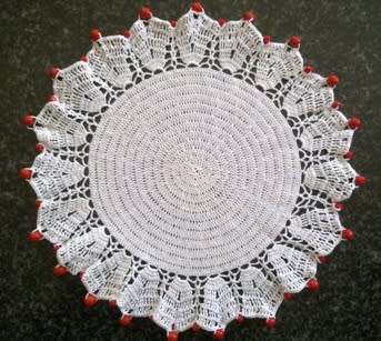 Vintage glass beaded doilie with red glass beads