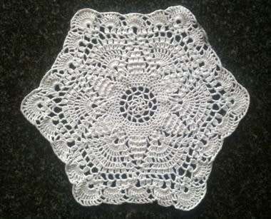 Unusual hexagonal white cotton crochet doilie 28cm